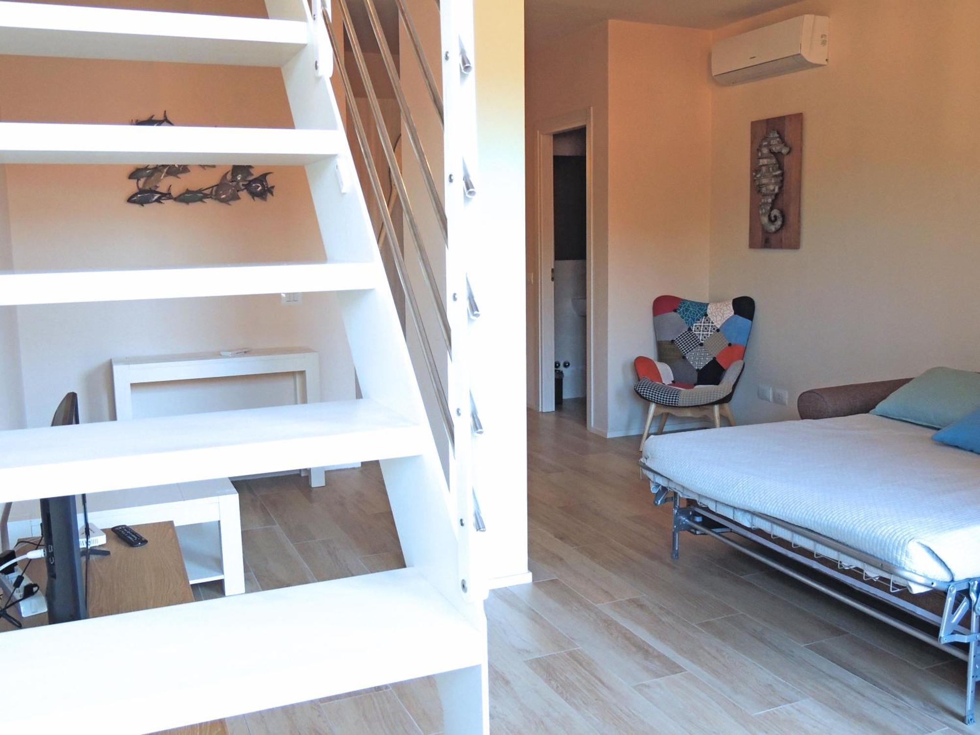 Sogno Azzurro Apartman Porto Azzurro Szoba fotó