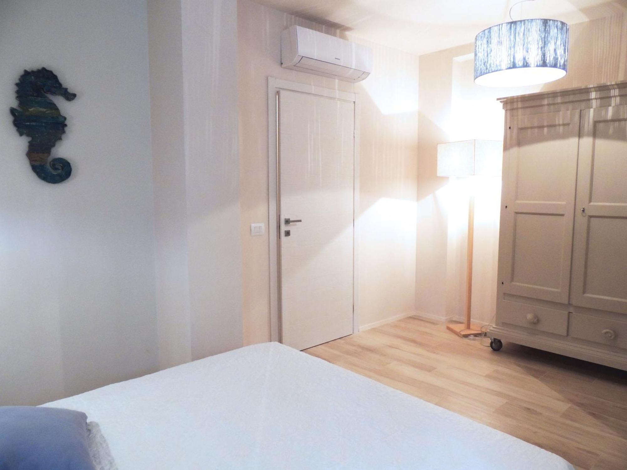 Sogno Azzurro Apartman Porto Azzurro Szoba fotó